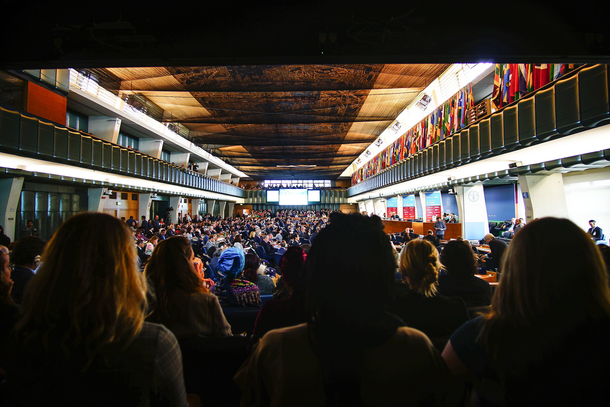 Our storytelling team sits in the plenary hall for the opening session of the Committee on World Food Security’s 46th conference on Oct. 14, 2019.